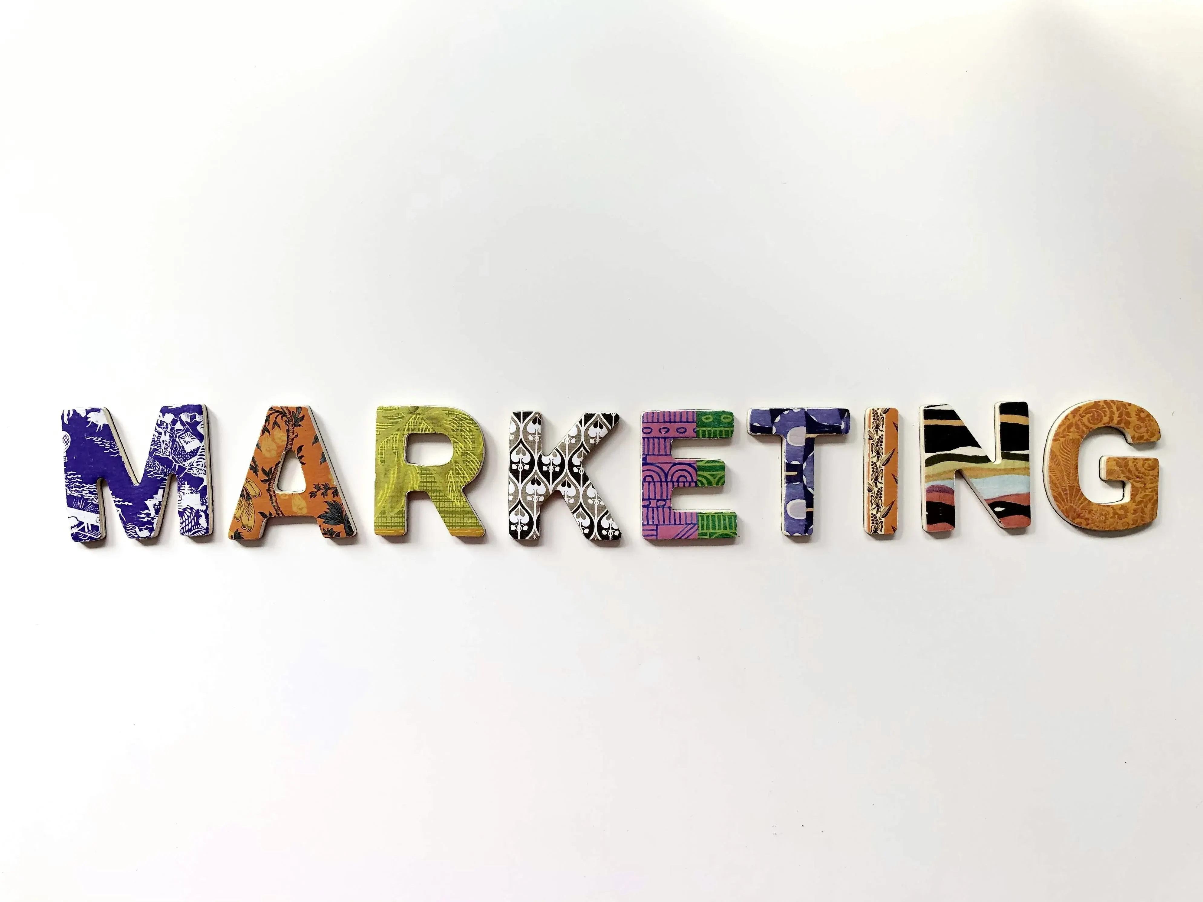 Stock Footage of the word "MARKETING" in colorful letters on white background